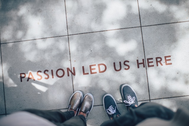 The Letters for “Passion Led Us Here” Sitting on Tiles